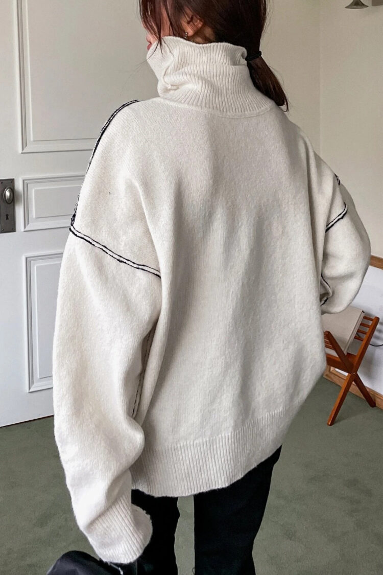 Ilgas baltas megztinis